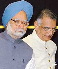 Prime Minister Manmohan Singh and Union Minister for Home Shivraj Patil during the inauguration of a conference of Chief Ministers at Vigyan Bhavan in New Delhi on Friday. 