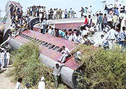 Rescue work in progress at the accident site at Samiyala in Gujarat where the Sabarmati Express collided with a goods train early morning on Thursday. 
