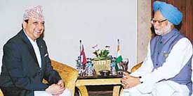 Prime Minister Manmohan Singh with Nepals King Gyanendra in Jakarta on Saturday. 