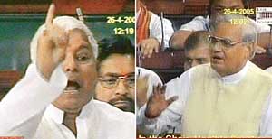 TV images of Laloo Prasad Yadav and Atal Bihari Vajpayee in Parliament in New Delhi on Tuesday.