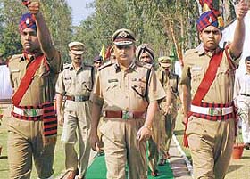 The new IGP of Chandigarh, Mr Satish Chandra, takes guard of honour at the Police Lines in Sector 26 in Chandigarh