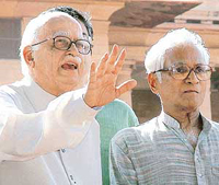 BJP President L.K. Advani and NDA Convener George Fernandes address the media after giving a memorandum to the President in Delhi on Thursday.