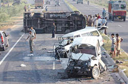 The mangled remains of the three vehicles, which collided with one other on the Jalandhar-Pathankot road
