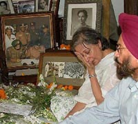 Anita Kalra, daughter of Lt-Gen J.S. Aurora, mourns the death of her father at Friends Colony in Delhi on Tuesday.