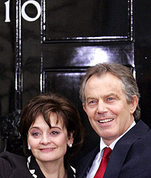 Britain's Prime Minister Tony Blair and his wife Cherie arrive back at 10 Downing Street in London on Friday.