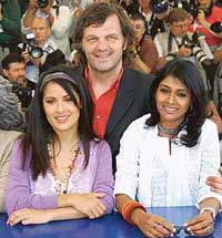 Sarajevo-born director and festival jury president Emir Kusturica (centre) poses with jury members, Mexican actress Salma Hayek (left) and Indian actress Nandita Das, during a photo call on the opening day of the 58th Film Festival in Cannes on Wednesday. 