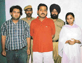 Members of a gang of alleged cheats arrested by the Chandigarh police on Thursday.