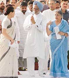 Prime Minister Manmohan Singh greets Congress President Sonia Gandhi during the 14th death anniversary function of Rajiv Gandhi at Veer Bhumi in New Delhi on Saturday.