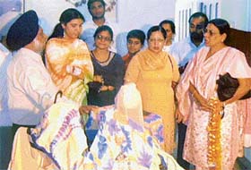 Visitors look at the creations made by students of the Param Institute during their annual exhibition in Ludhiana