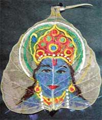 Lord Krishna painted on peepal leaf by I.S. Raja on display at an exhibition at Saraswati Modern School, Ludhiana on Saturday