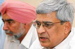 Mr Prakash Karat, General Secretary of the CPM (right), addresses a press conference in Chandigarh on Sunday. Mr Balwant Singh, Secretary, CPM, Punjab, is seated next to him.