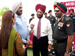 Mr Milkha Singh and G.S. Randhava with the Army chief, Gen J.J. Singh, and his wife during a function 'Young Talent for Mission Olympics'  Catch them Young, in New Delhi on Wednesday.