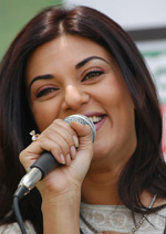 Bollywood actress Sushmita Sen addresses mediapersons after teeing off the Tag Heues Golf Championship at Royal Springs Golf Course near Dal Lake in Srinagar on Saturday. 