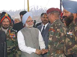 Prime Minister Manmohan Singh with Army Chief J.J. Singh (left) talking to jawans at 14 Corps in Leh on Saturday.