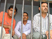 Employees of the Baba Farid University of Health Sciences arrested in the PMT paper leak case behind bars in Faridkot on Sunday.