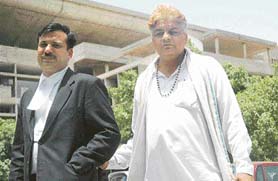 Mr Naresh Kumar Kadyan and his counsel in the Punjab and Haryana High Court on Tuesday in Chandigarh.