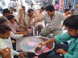 Prasad and sweet water being served at stalls on road side on the eve of Nirjala Ekadashi.