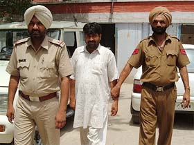 Pawan Kumar being produced in a court in Bathinda