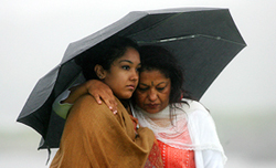 Relatives of victims of Kanishka crash comfort each other before a memorial service to mark the 20th anniversary of the bombing in Ahakista, southern Ireland, on Thursday.