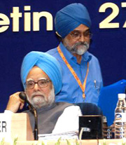Prime Minister Manmohan Singh and Deputy Chairperson Montek Singh Ahluwalia at the 51st National Development Council meeting in New Delhi on Monday.