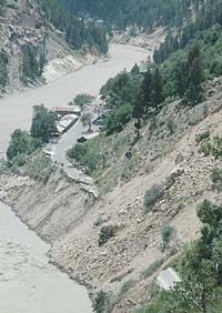 The road from Rekong Peo to Kaurik is blocked by a landslide at Pauri village in Kinnaur district on Tuesday.