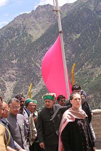 Congress President Sonia Gandhi is accompanied by Chief Minister Virbhadra Singh during a brief halt at Rekong Peo, Kinnaur district, during her visit to the flood-ravaged areas on Wednesday.