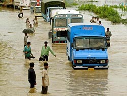 A flooded national highway, 40 km south of Ahmedabad, on Friday.