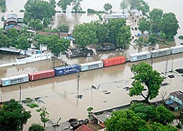 An aerial view of a half- submerged freight train in Central Gujarat on Saturday.