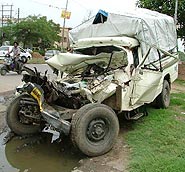 The mangled remains of the jeep in which the victims were travelling.