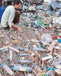 A junk dealer in Dhanas, Chandigarh, on Saturday with disposed of syringes