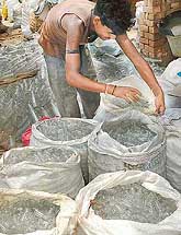 Washed injection vials being packed for further transmission in Chandigarh on Monday. 