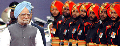 Prime Minister Manmohan Singh inspects the guard of honour prior to his speech from the ramparts of the Red Fort, as the nation celebrated its 58th anniversary of Independence, in New Delhi on Monday