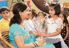 Students of Love Dale School, Ludhiana, celebrate Teachers' Day by offering flowers to their teachers