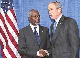 UN Secretary-General Kofi Annan (left) greets US President George W. Bush prior to a meeting at the United Nations of the 60th anniversary summit of the UN General Assembly in New York.