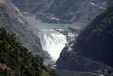 A view of the Chenab with the Baglihar hydroelectric project in the background, about 155 km northwest of Jammu, on Sunday