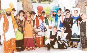 Greek artistes pose with the Punjab folk troupe during the international folk festival in Lefkas Islands, Greece
