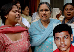 Mrs Swaran Kanta Jain and Mrs Shelly Jain, mother and wife, respectively, of Sunil Jain, who died in a road accident, are consoled by relatives at Nawanshahr on Monday.