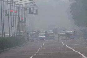 A thick smoky screen veiled the city for the whole day