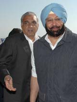 Haryana Chief Minister Bhupinder Singh Hooda and Punjab Chief Minister Amarinder Singh after the Northern Zonal Council meeting in Shimla on Tuesday