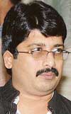 UP Minister for Food and Civil Supplies Raghuraj Pratap Singh, alias Raja Bhaiya, announces his decision to resign from the ministry in Lucknow on Thursday.