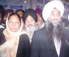Paramjit Kaur Khalra with her counsel Brijinder Singh Sodhi at District Courts in Patiala on Friday.