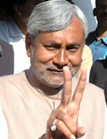 JD (U) leader Nitish Kumar shows the victory sign as the alliance sweeps the Bihar Assembly elections on Tuesday. 