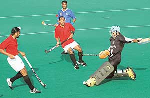 Mohd Habibul Haq, goalkeeper of East Zone, clears the ball during their match against North Zone in the 35th All-India FCI Inter-Zone Hockey Tournament at Sector 42, Chandigarh, on Tuesday.