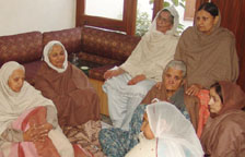 Shell-shocked relatives of Lt-Commander H.S. Pannu, who died in an air crash in Goa, wait for the body at his house in Amritsar on Tuesday