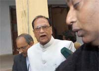 Bihar vigilance officers arrest Bihar Public Service Commission Chairman Ram Singhasan Singh after a raid in the BPSC office in Patna