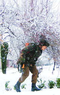 A jawan on patrol duty near an Army camp in Srinagar on Monday