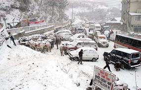 A view of Kufri market after snowfall on Tuesday.