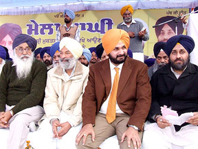 SAD president Parkash Singh Badal, BJP MP Navjot Sidhu and other Akali leaders at the party’s Maghi conference in Muktsar on Friday.