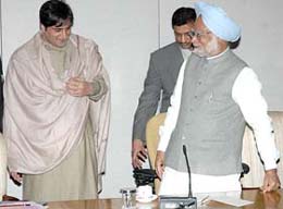 Peoples conference chief Sajjad Lone being welcomed by the Prime Minister, Dr Manmohan Singh, just before a meeting on the vexed Kashmir problem at the PMs house in New Delhi