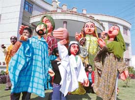 Students enjoy a puppet show organised at Ryan School, Ludhiana, on Friday